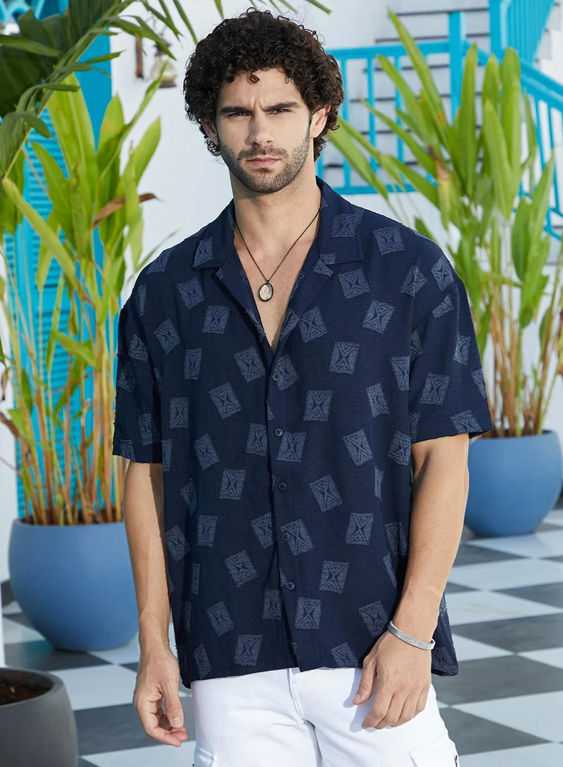 Campus Sutra Men's Onyx Black Indie-Cuban Oversized Shirt For Casual Wear | Cuban Collar | Short Regular Sleeves | Button Closure | Oversized Shirt Crafted With Comfort Fit For Everyday Wear